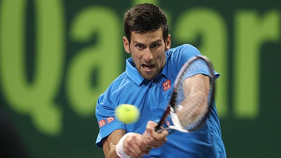 Petenis asal Serbia, Novak Djokovic dalam pertandingan melawan Andy Murray. - INDOSPORT